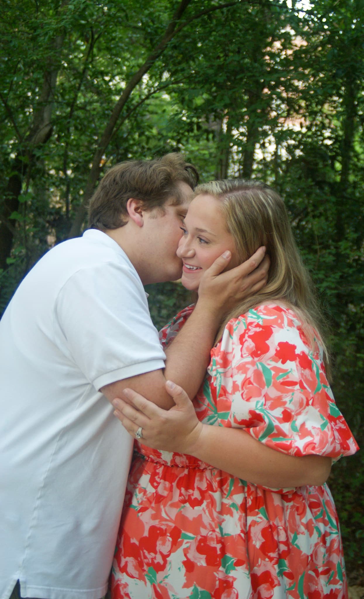 Couple maternity portrait with a close affectionate pose