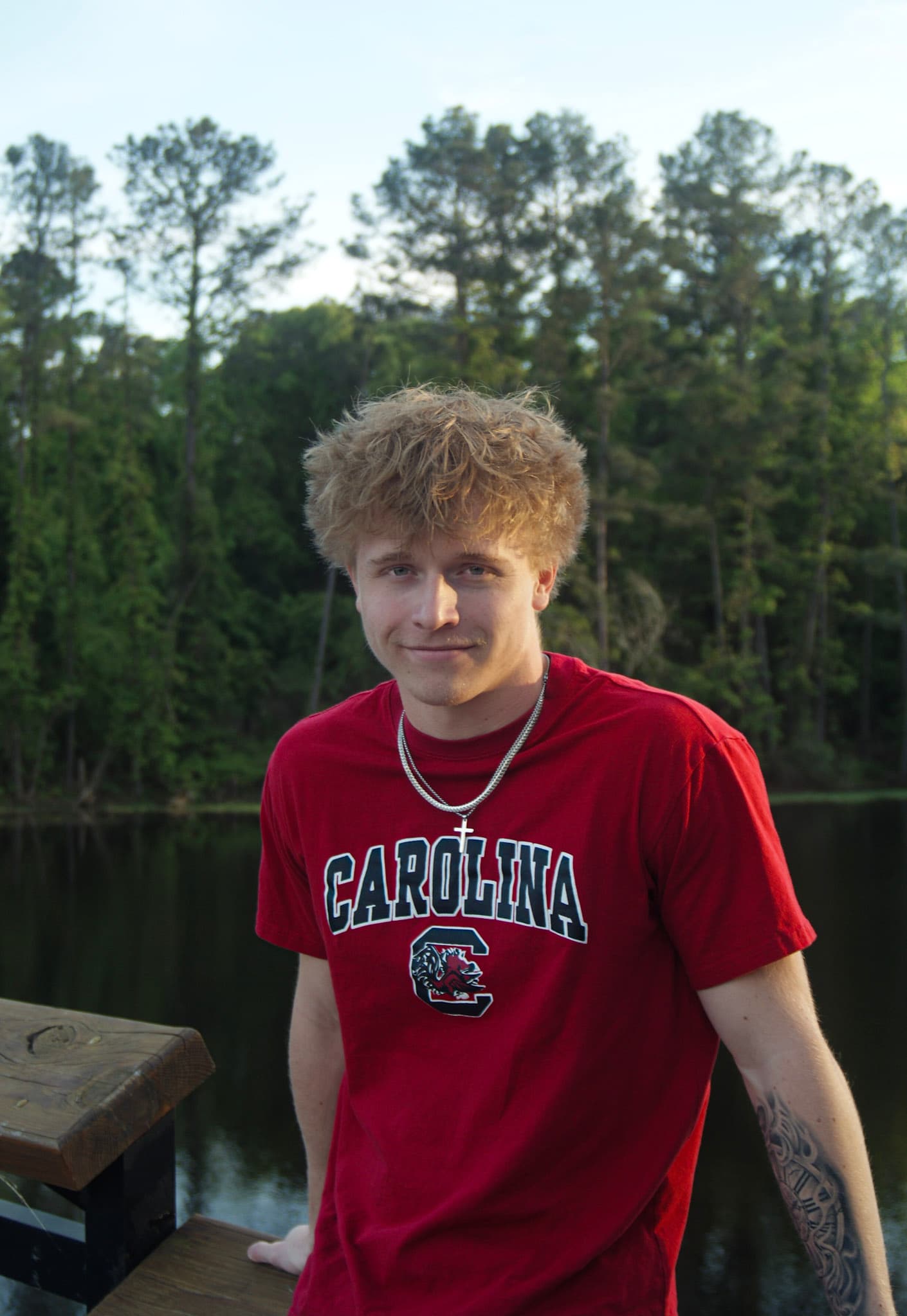 Graduation portrait near campus architecture